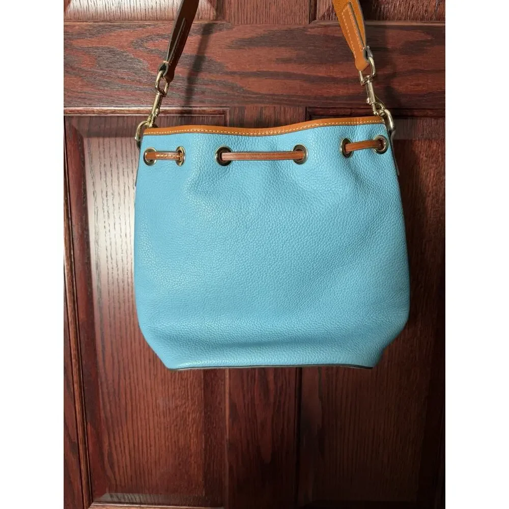 Dooney & Bourke Pebble Grain Drawstring Bucket Bag Blue Leather Red Interior